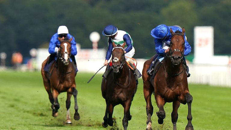 William Buick glances behind as Adayar wins easily at Doncaster