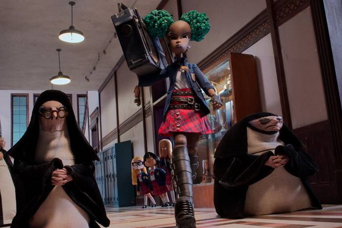 A still of an animation showing a girl in a punky outfit and green hair, striding down a school corridor with two nuns on either side