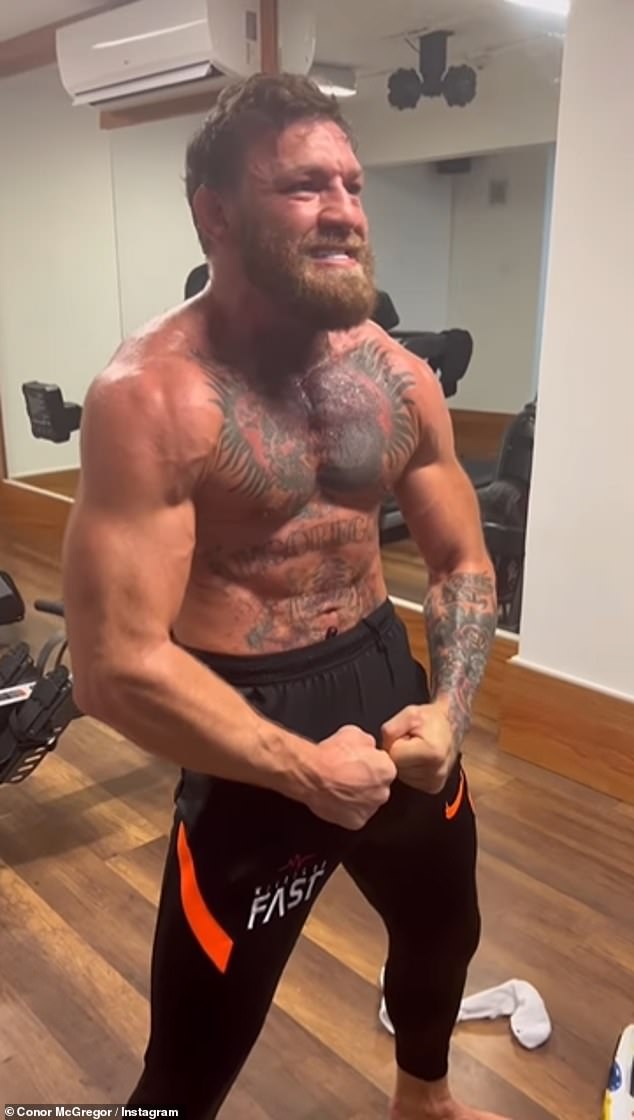 Shirtless Conor McGregor shows off his jawdropping muscles and inked
