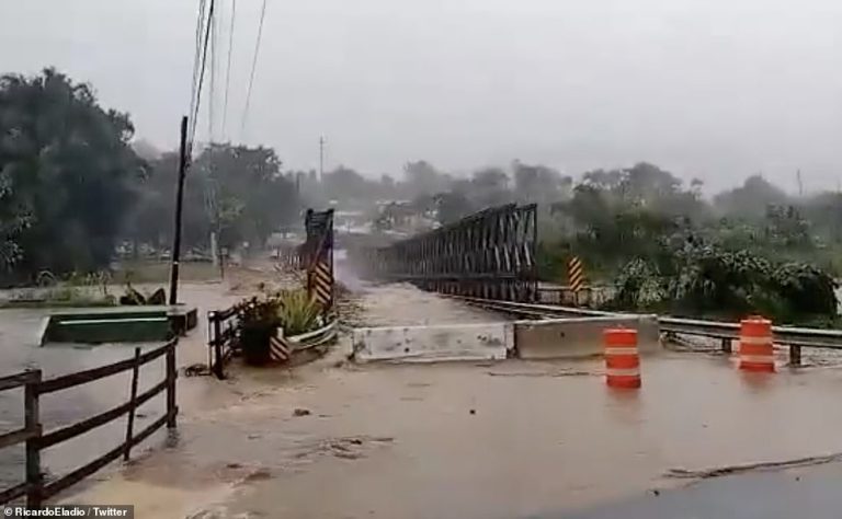 Terrifying moment a BRIDGE is swept away in Puerto Rico as Hurricane Fiona brings flooding