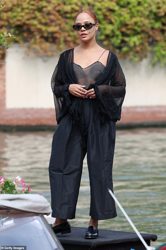 Tessa Thompson flashes her bra through sheer top as she arrives at hotel during Venice Film Festival