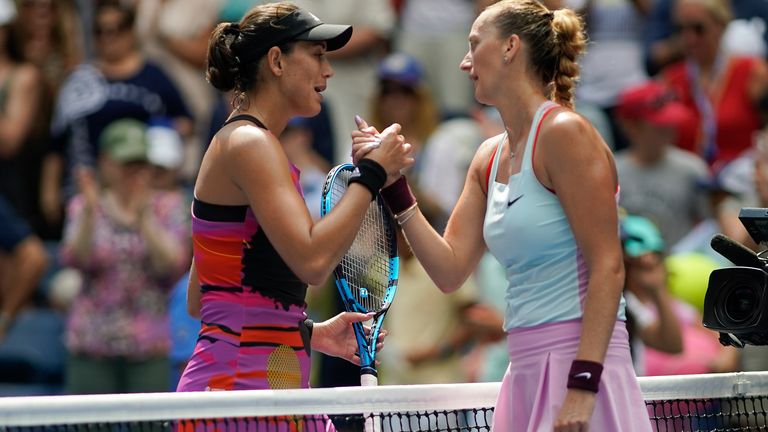 Garbine Muguruza, of Spain, and Petra Kvitova, of the Czech Republic, shake hands after Kvitova won their third-round match of the U.S. Open tennis championships, Saturday, Sept. 3, 2022, in New York. (AP Photo/Eduardo Munoz Alvarez)