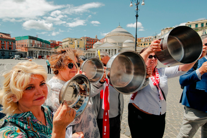 People protest against price rises at a demonstration in Naples. It is unclear whether Italy’s new government will be willing to put its citizens through further economic sacrifices