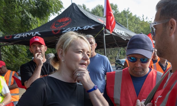 Sharon Graham, the United general secretary, talks to striking dock workers outside Felixstowe port.