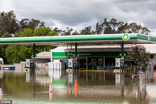 Residents in Shepparton, Orrvale, Murchison and Mooroopna have been told it was too late to leave their communities (pictured, a flooded BP petrol station in Shepparton)