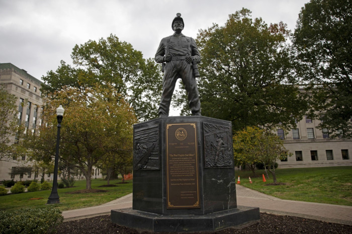 The West Virginia Coal Miner statue outside of the State Capitol building in Charleston