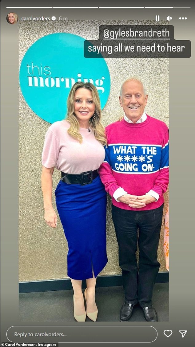 Poser: Donning a mauve pink short-sleeved light jumper tucked into her midi-length skirt, her tiny waist was synched in with a statement black buckle belt