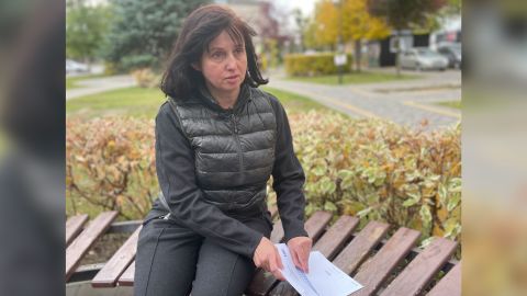 Olena Yuzvak shows the letter from her son Dima that was sent from Russia and delivered by the International Committee of the Red Cross. Written on it, just three words, 