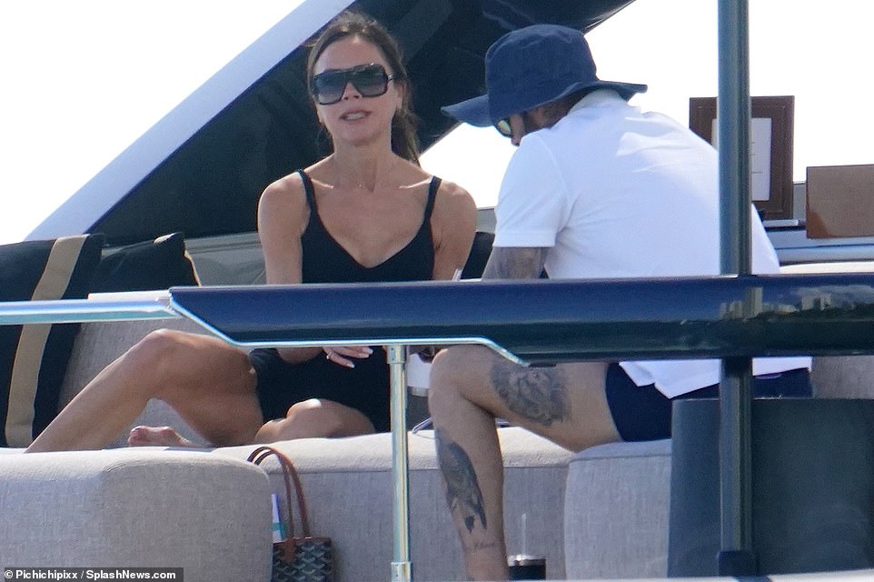 Chinwags: Victoria and David chatted away while sitting together on the yacht