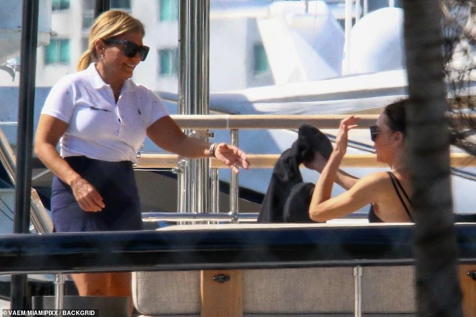 Sunny days: Victoria was sure to top up her tan in the Miami sunshine