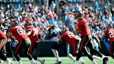 Brady passes the ball in the third quarter against the Panthers.