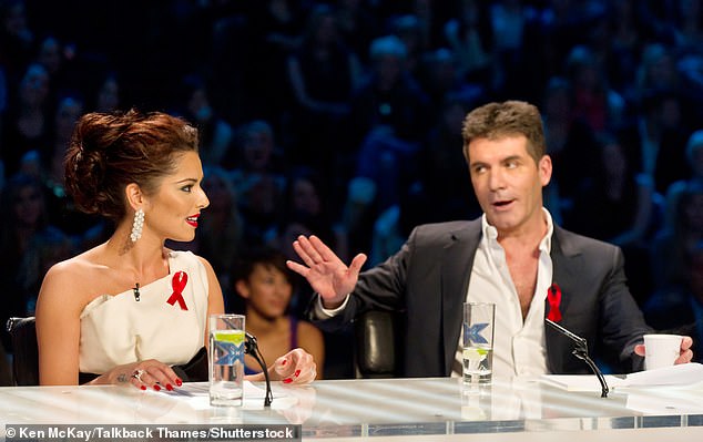 Old times: Cowell's straight-talking appraisals as head judge on The X Factor helped earn him a reputation as TV's Mr. Nasty, but behind the scenes he admits to working round the clock