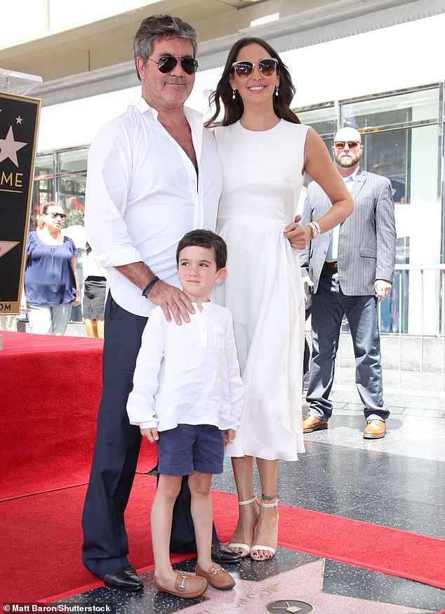 My boy: Cowell says becoming a father late in life helped steer him away from his dark, desperate and ultimately doomed attempt to salvage The X Factor