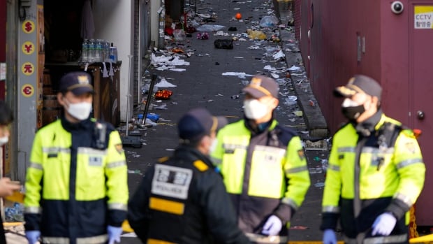 Concerned relatives in South Korea rush to hospitals after 151 die in Halloween crowd surge