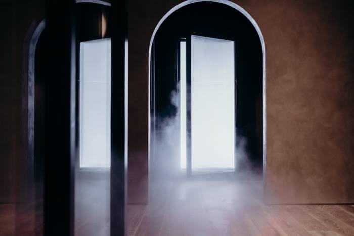 Dry ice coming out the entrance to the cryotherapy chamber