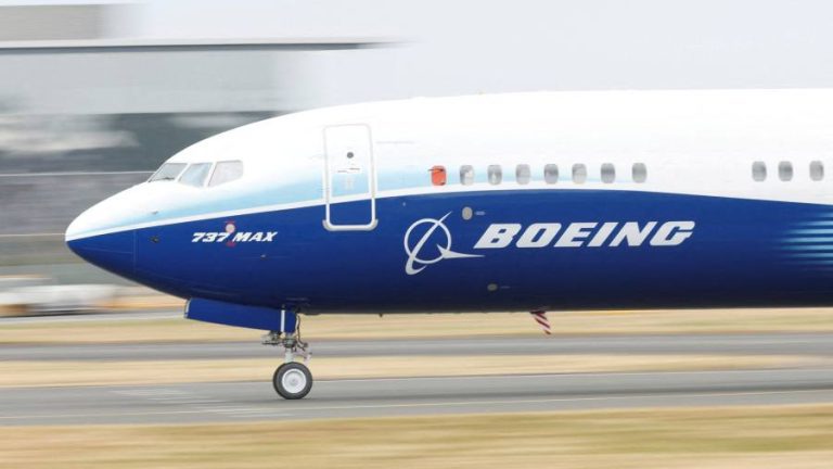 Boeing cuts 737 Max delivery outlook again as it reports $3.3bn loss