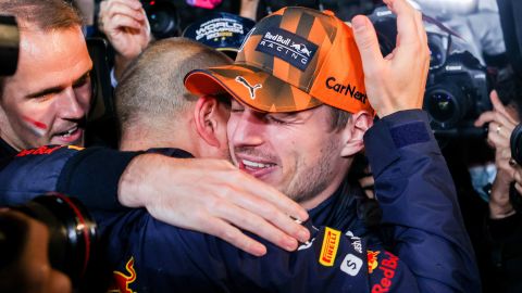 Max Verstappen celebrates becoming F1 world champion with his race engineer, Gianpiero Lambiase.