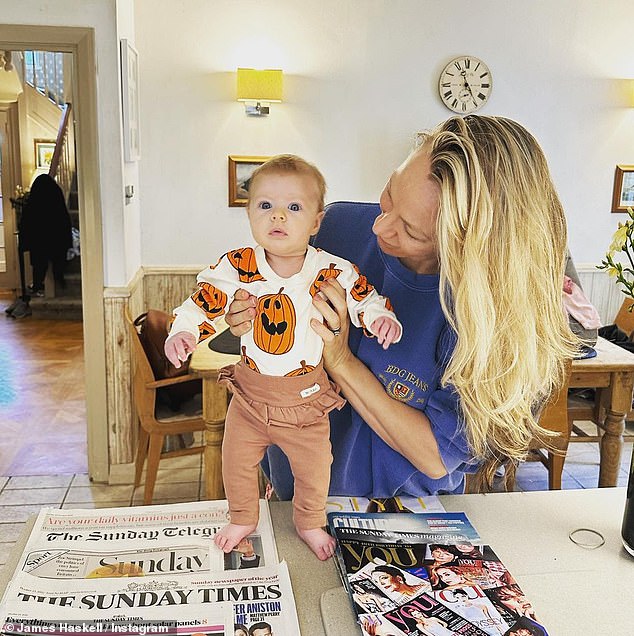 Chloe Madeley gazes adoringly at daughter Bodhi as two-month-old wears adorable pumpkin outfit