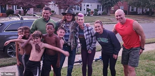 Johnny Depp returns to his hometown in Kentucky and poses for snaps with fans