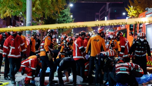 At least 120 killed in Halloween crowd surge in Seoul, officials say