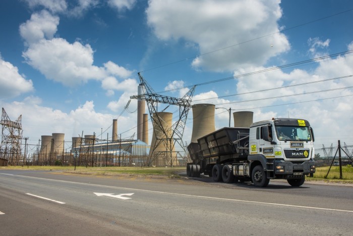 A truck departs from the Komati coal-fired power station, which was commissioned in 1961. The station was shut this week and will be used to show how old power plants can be repurposed