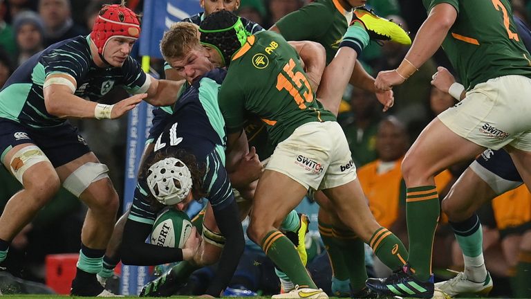 Cheslin Kolbe (No 15) was penalised for lifting Ireland's Mack Hansen (No 11) dangerously 