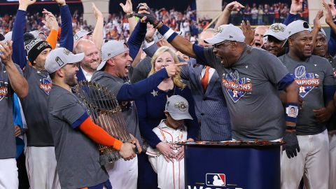 Baker celebrates with his team. 