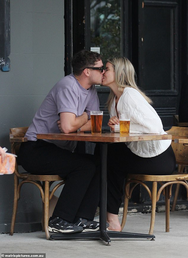 The former Married At First Sight star, 29, and her beau shared a passionate kiss as they had lunch in Sydney