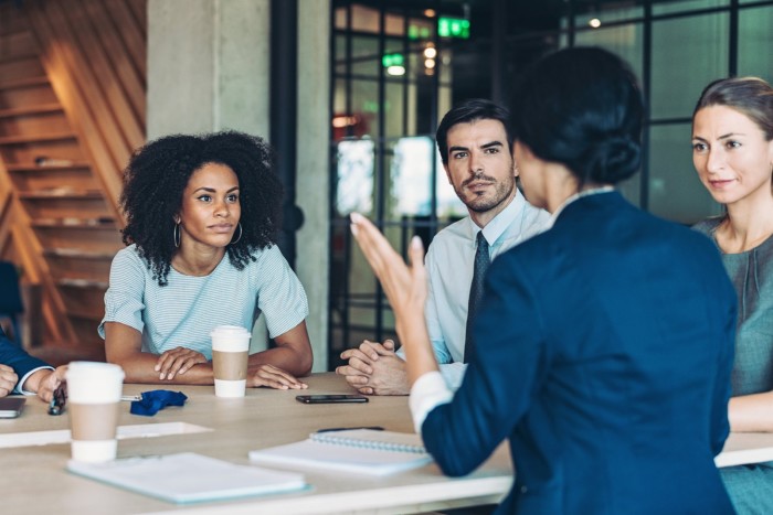 Multi-ethnic group of business persons having a discussion