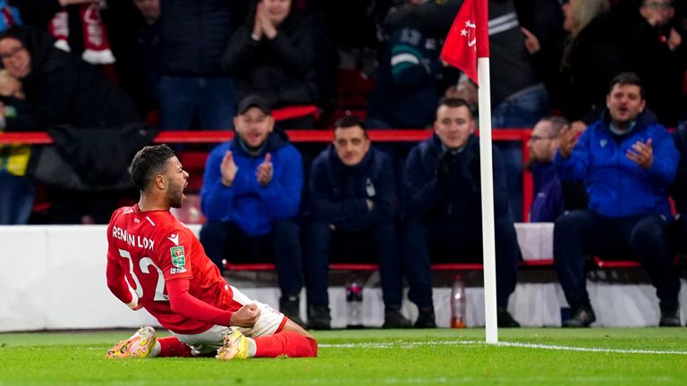 Nottingham Forest&#39;s Renan Lodi celebrates after scoring against Tottenham