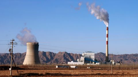 Smoke rises from the chimney of a coal-fired power plant in Gansu Province, China, in February. China and the US have historically been the largest greenhouse gas emitters.