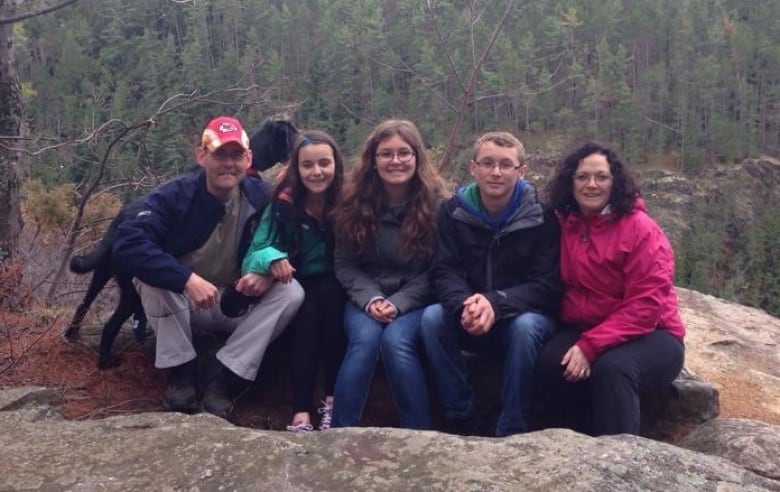 A family photo on a hike.