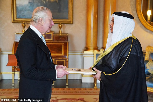 King Charles held several audiences at Buckingham Palace yesterday, including this meeting with Bader Mohammad Al Awadi, the Kuwaiti ambassador