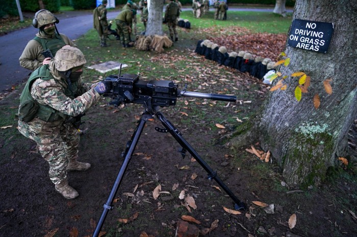 Ukrainian soldiers practice a weapons drill at the northern England training facility