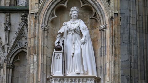 The statue of Queen Elizabeth II sits on the west front of York Minster in northern England.