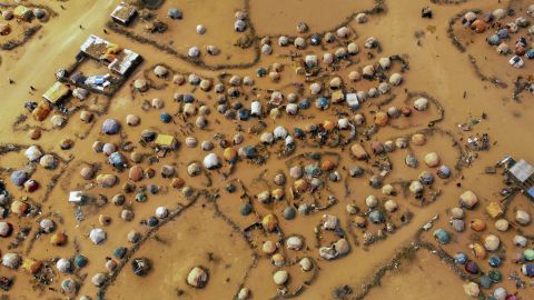 Huts made of branches and cloth provide shelter to Somalis displaced by drought on the outskirts of Dollow, Somalia, in September.