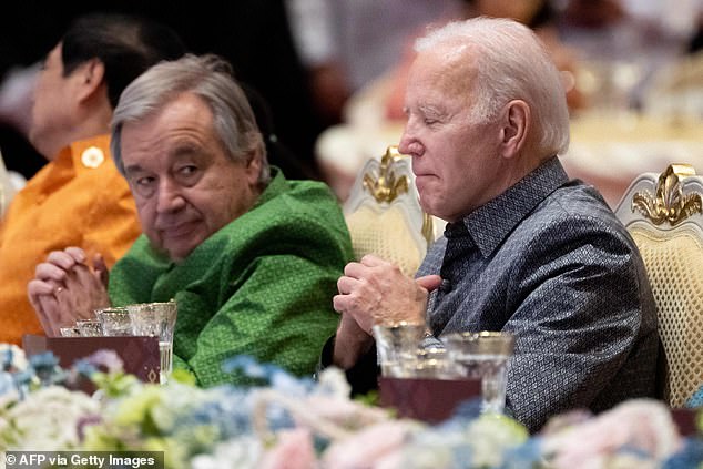 US President Joe Biden, with UN Secretary-General Antonio Guterres (L), attends the East Asia Summit Gala dinner in Phnom Penh