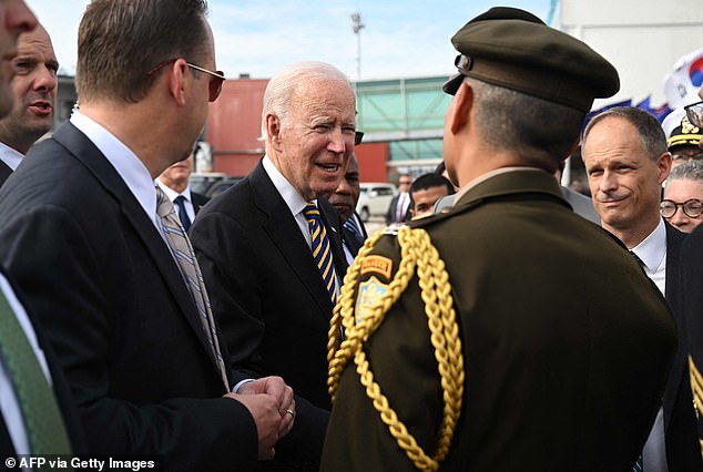 The president greeted US embassy staff after he landed