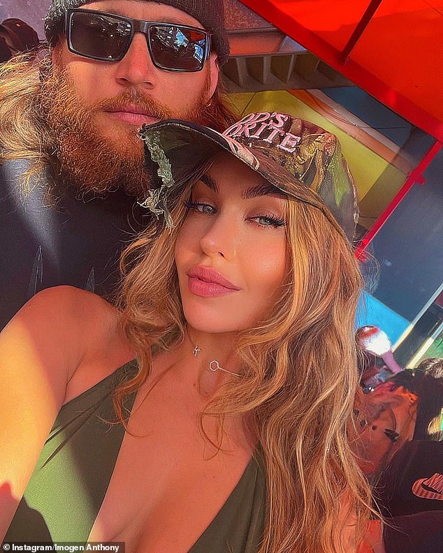 Imogen Anthony shared a rare photo of her cuddling up to her mystery boyfriend as they spent the day at Luna Park on Tuesday