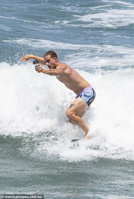 Before their impromptu photo shoot, Jordie went surfing with his GoPro camera