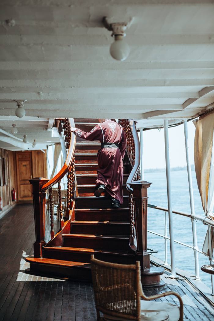 Person walks up a staircase