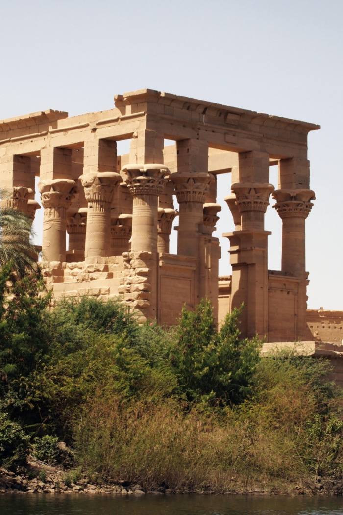 Egyptian ruins surrounded by scrub land