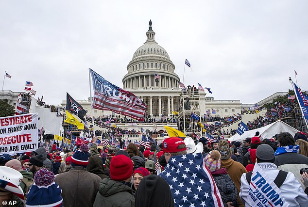 The insurrectionists are seen surging into the building, with Pence and others inside