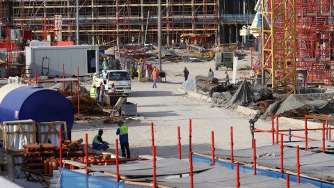 Migrant laborers work at a construction site at the Aspire Zone in Doha on March 26, 2016. 