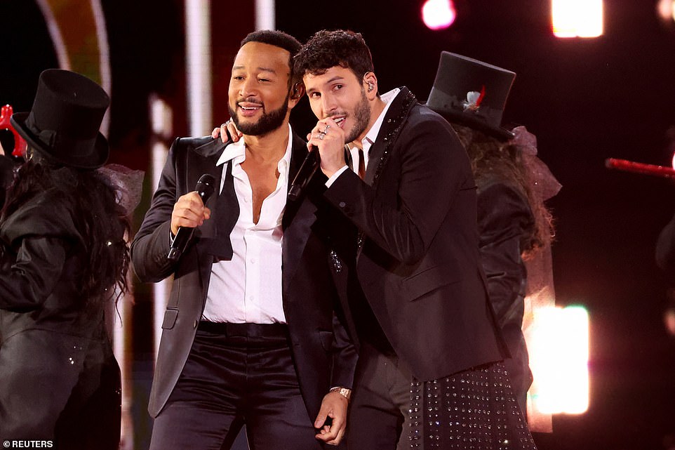 Two's company: John Legend performed Nervous alongside Sebastian Yatra as they danced around the stage