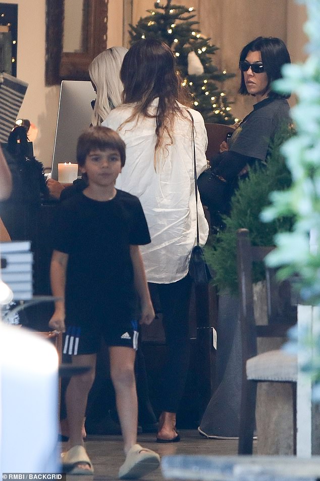 Chat: Kourtney kept a watchful eye on Reign as the family shopped