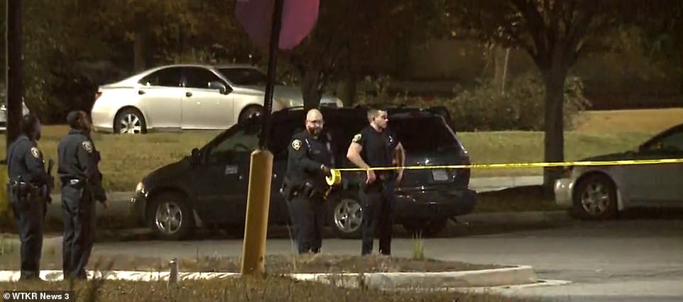 Police putting out tape after the horrific shooting at the Walmart located just off Battlefield Boulevard in Virginia