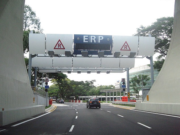 An 'electronic road pricing' gantry on a road in the Central Area of Singapore - which uses sensors to detect vehicles and charge drivers bespoke tolls based on their movements