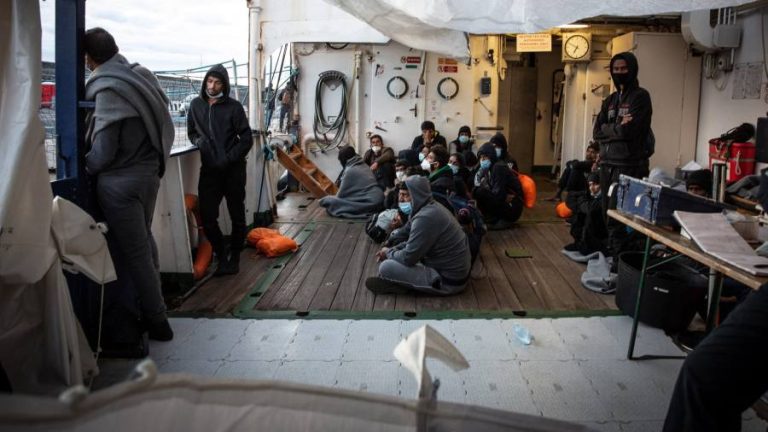 Italy blocks rescued migrants from landing and orders ship to leave port