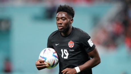 Alphonso Davies speaks before Canada’s final World Cup match